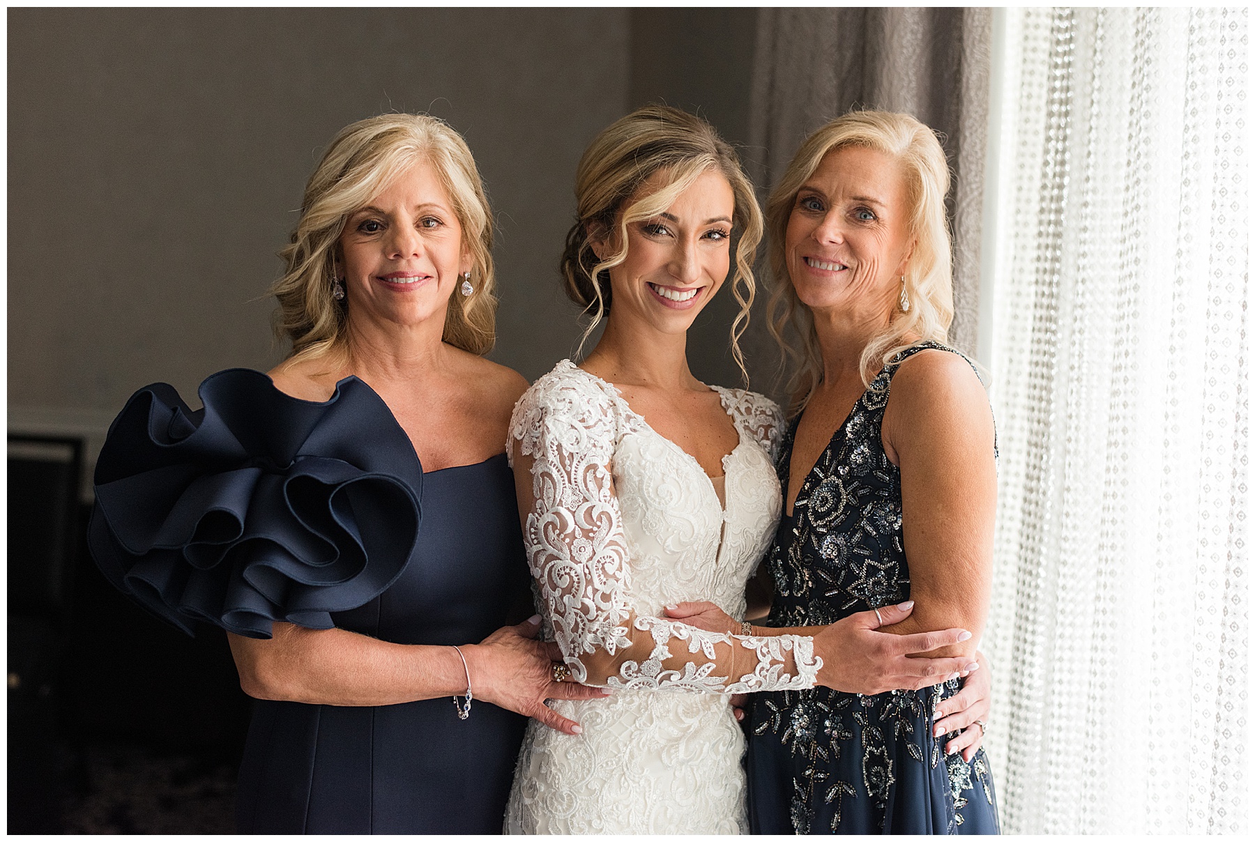 bride with mother and mother in law dressed