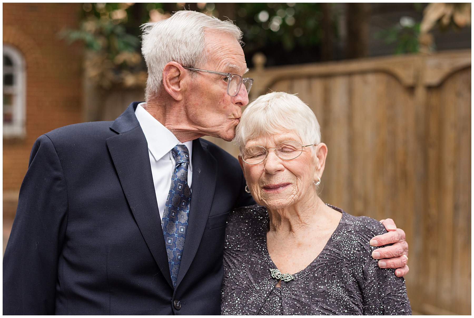 grandparents candid kiss