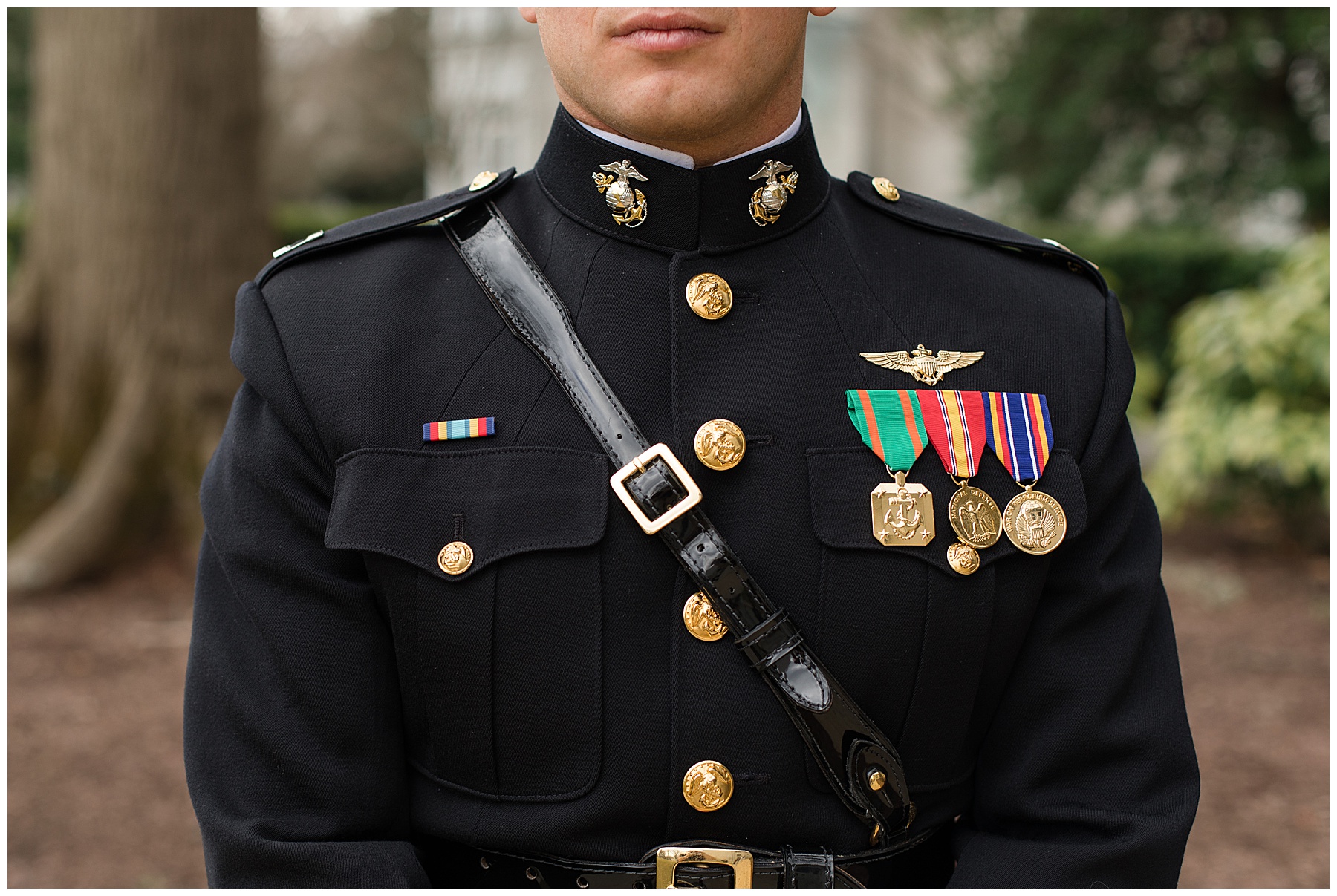 close up on groom uniform usna awards