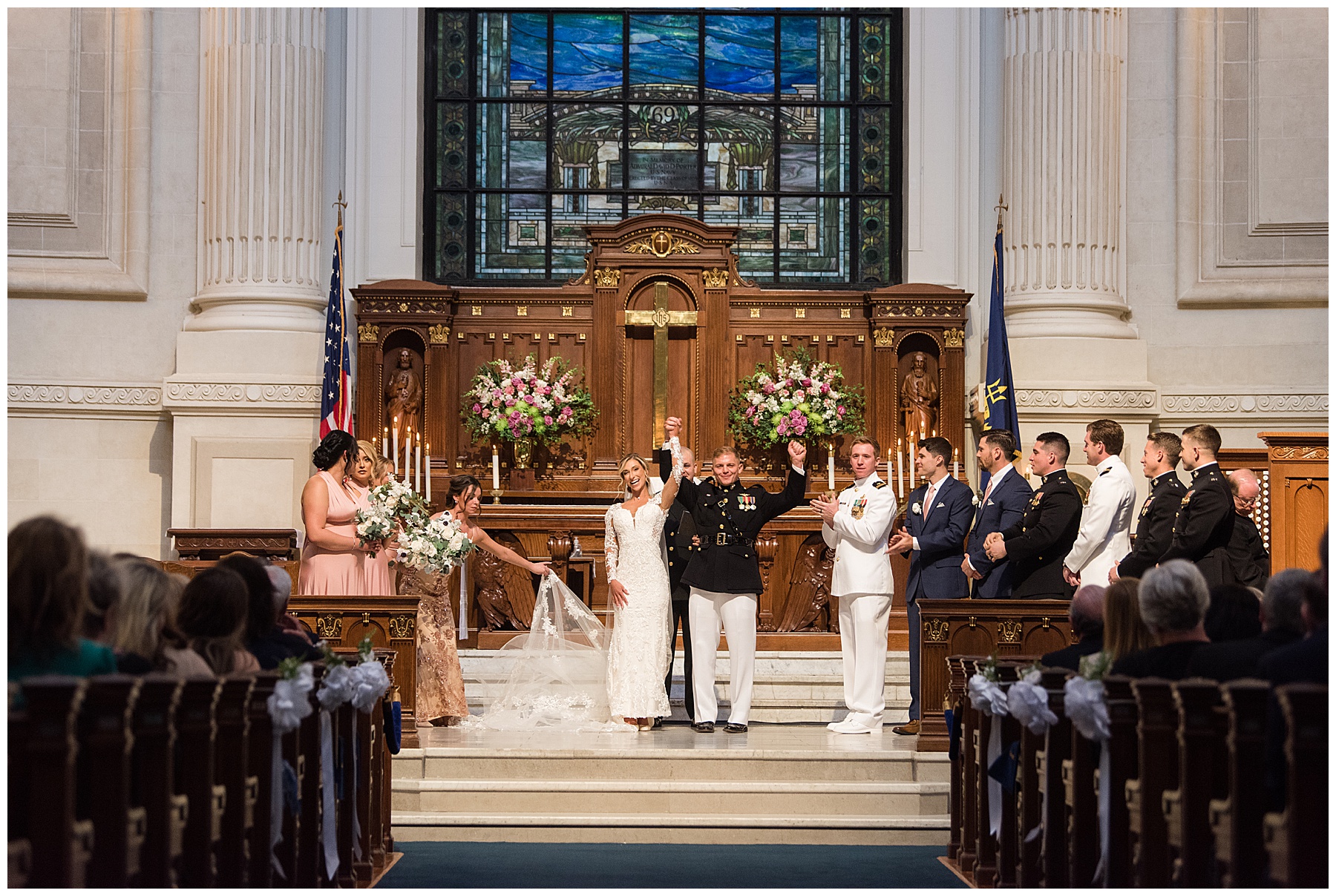 wedding ceremony at usna chapel cheering just married