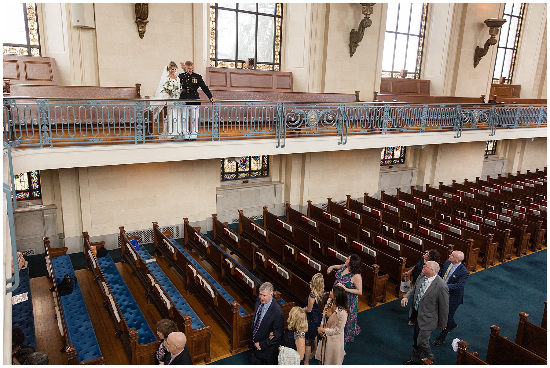 wedding ceremony at usna chapel couple in balcony