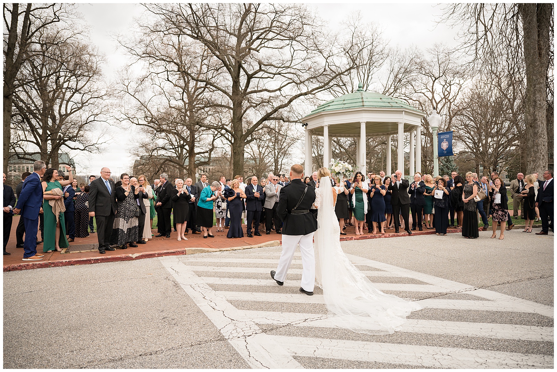 wedding ceremony at usna chapel greeting guests outside