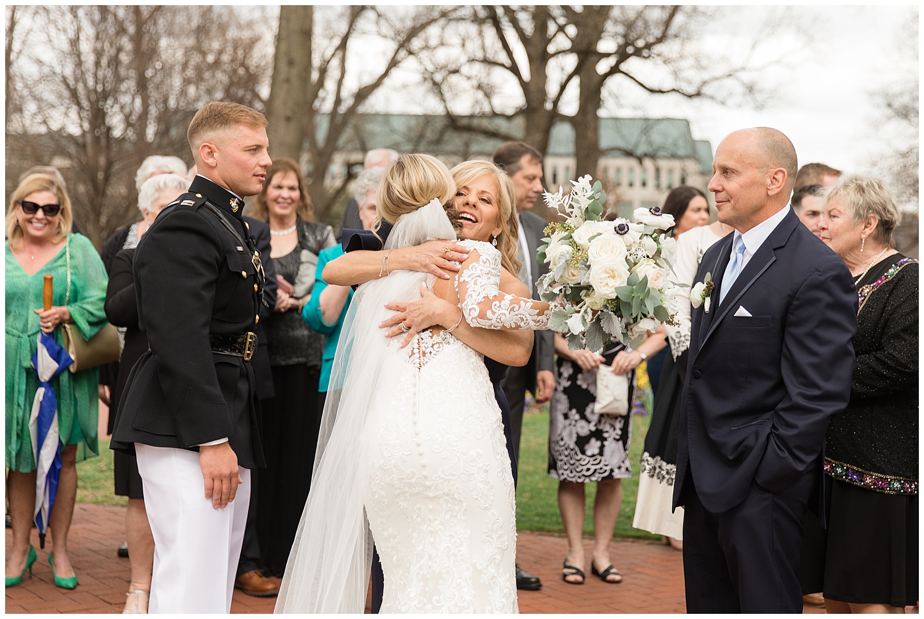 wedding ceremony at usna chapel greeting guests outside