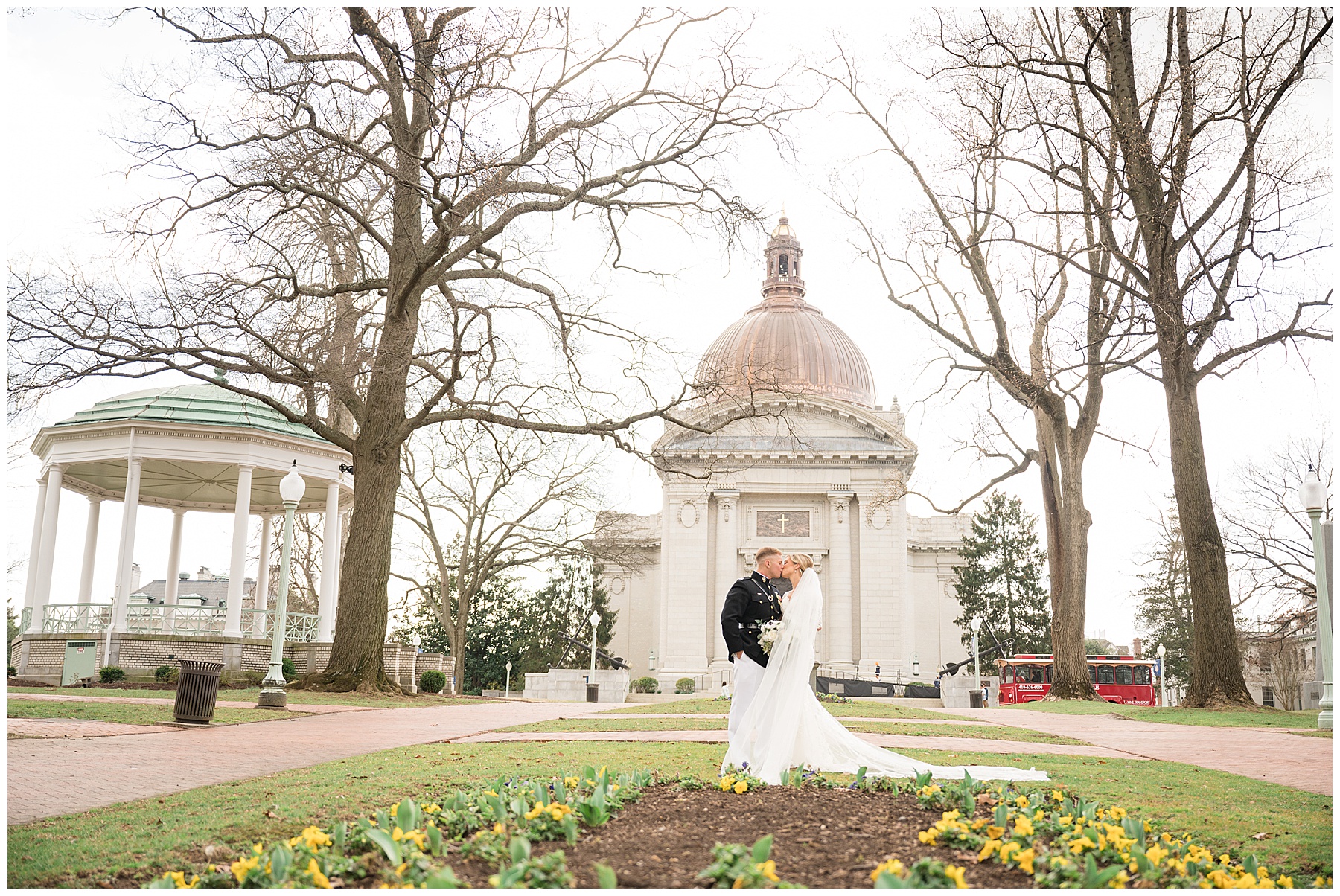 couple portrait at us naval academy chapel background