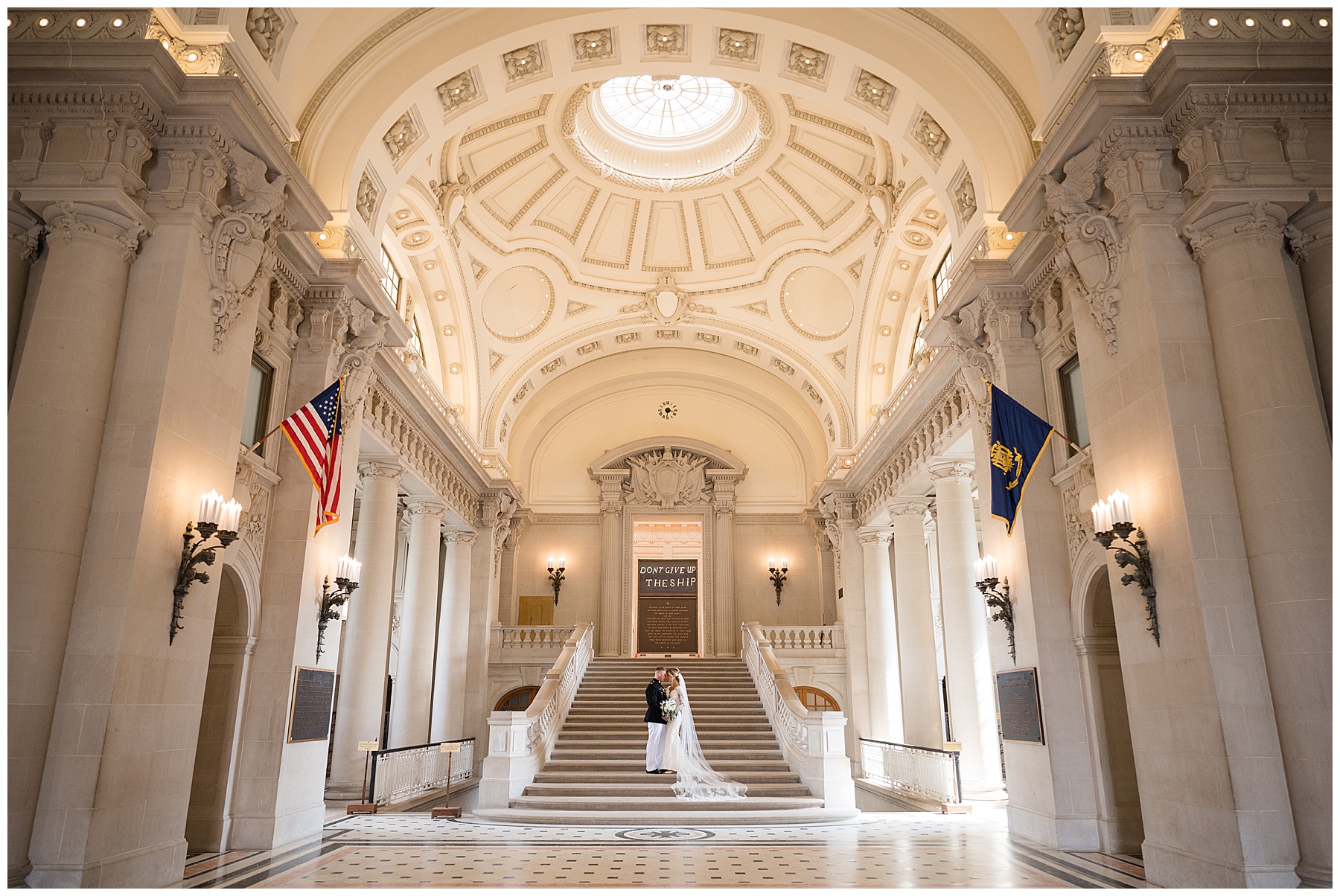 couple portrait usna bancroft hall wide inside