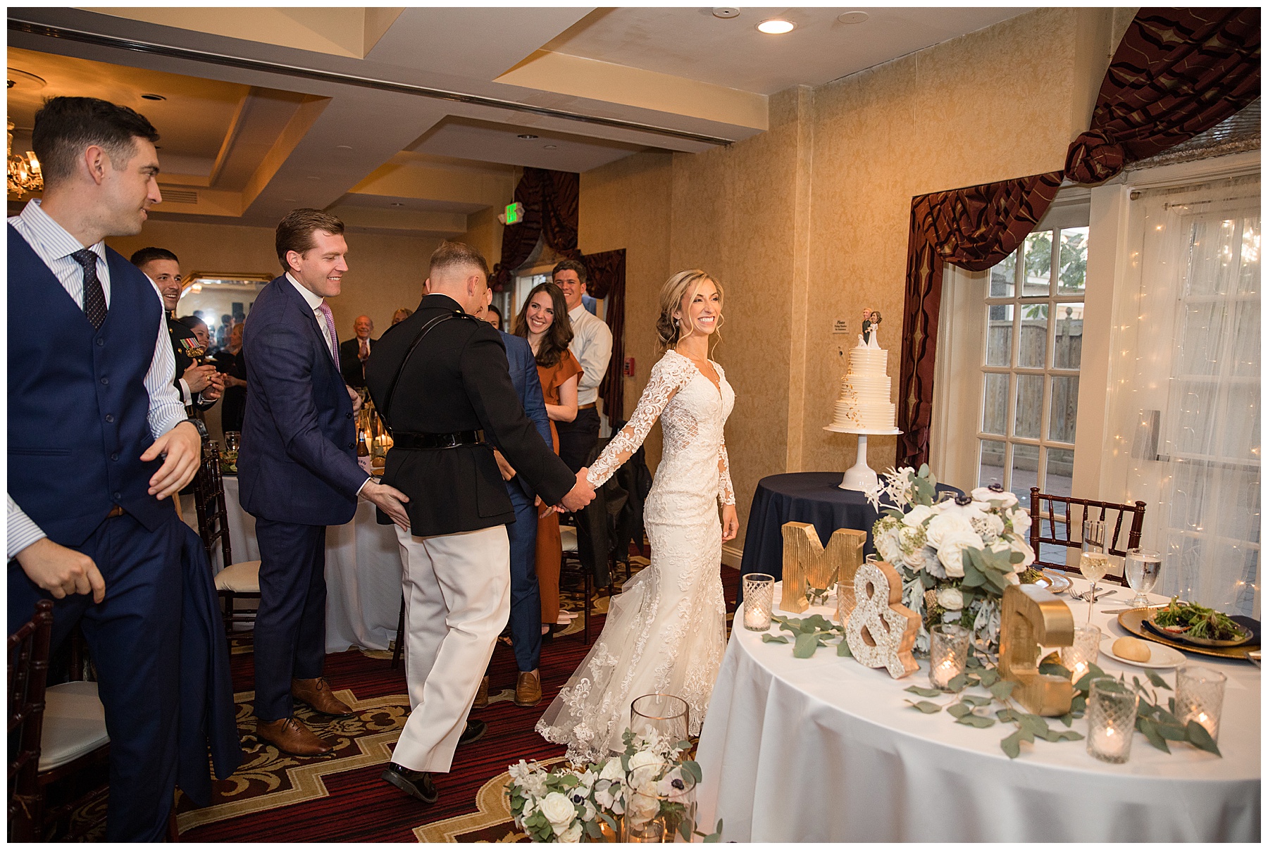 bride and groom go to cut cake wedding reception