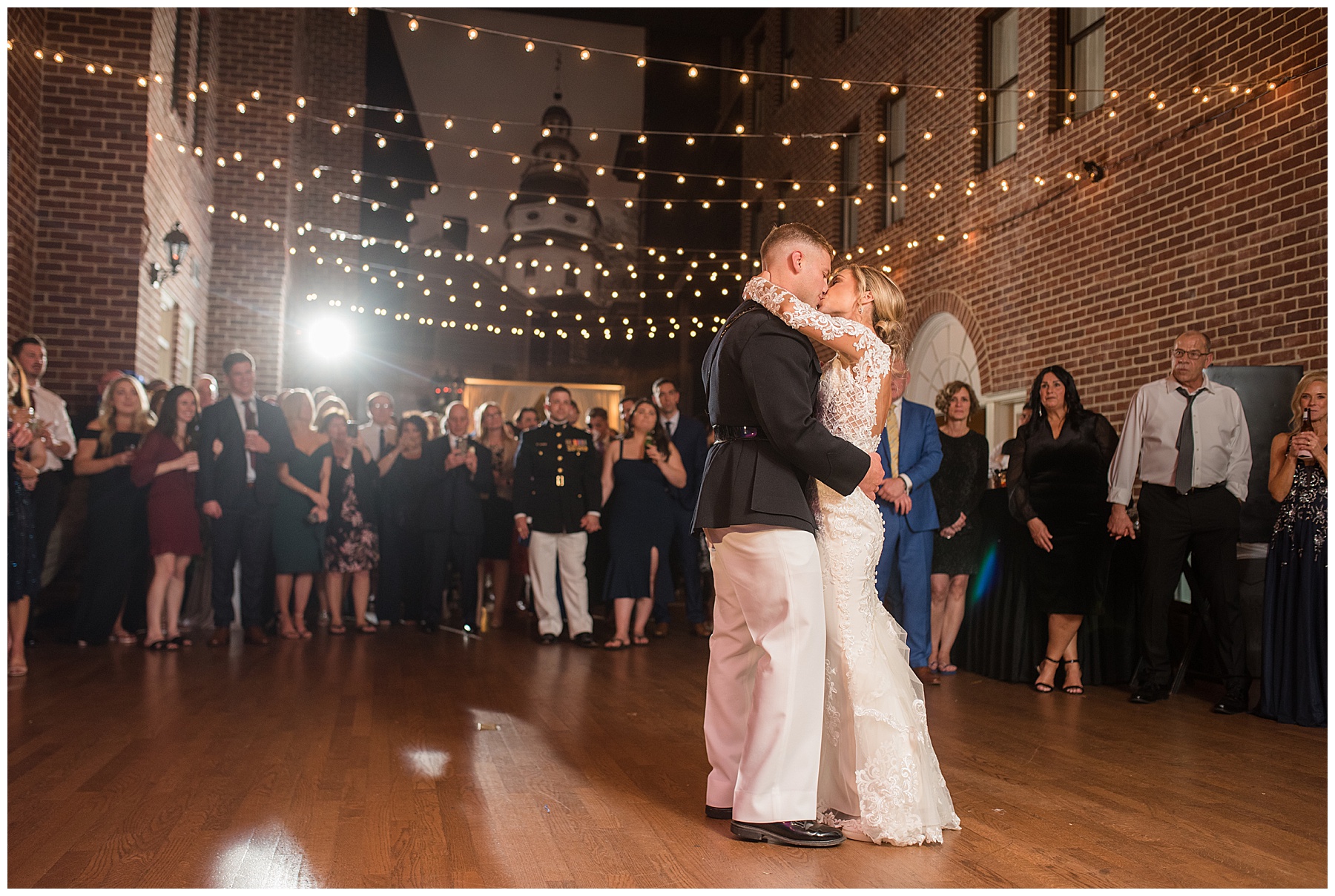 bride and groom first dance calvert house string lights