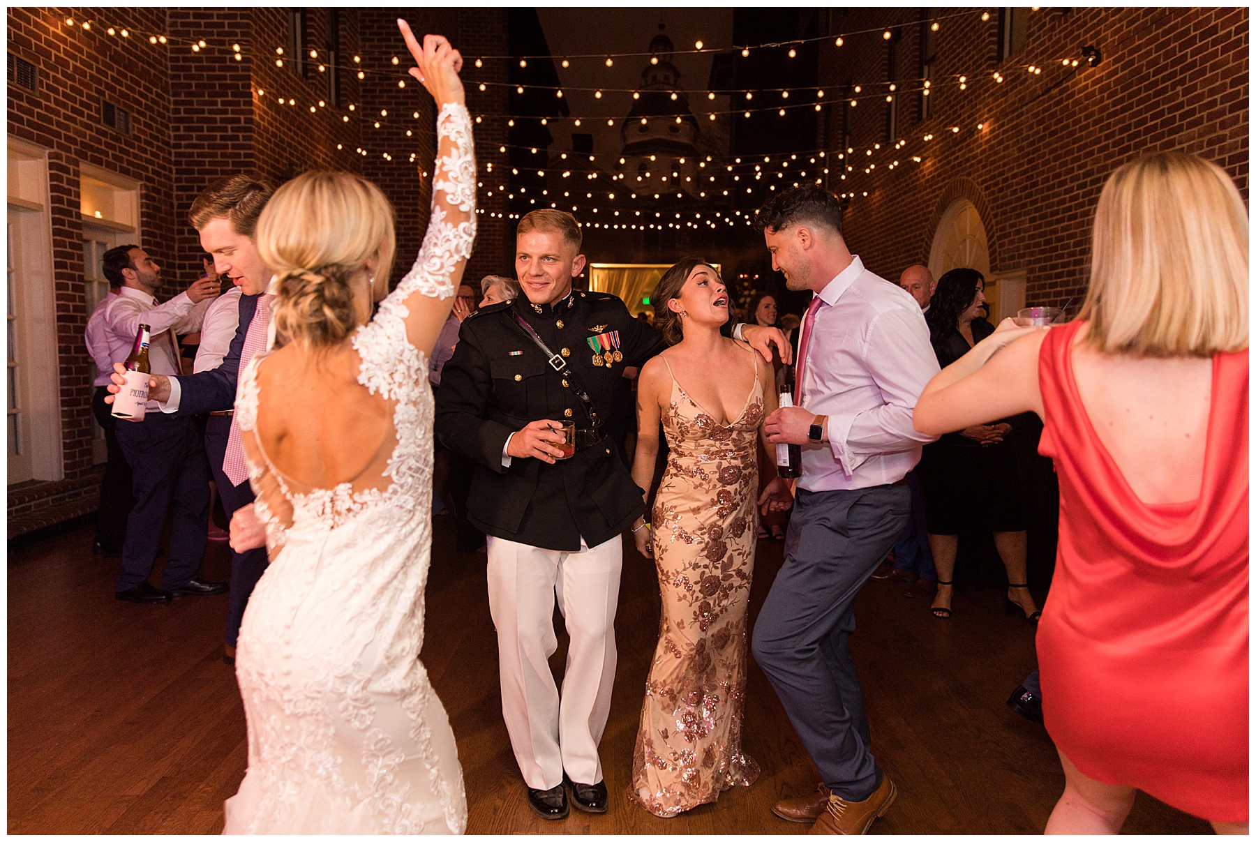 wedding reception dancing guests candid