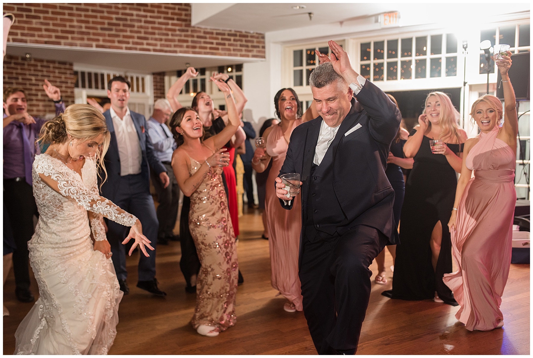 wedding reception dancing guests candid