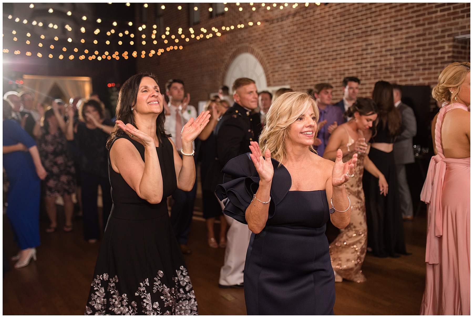 wedding reception dancing guests candid