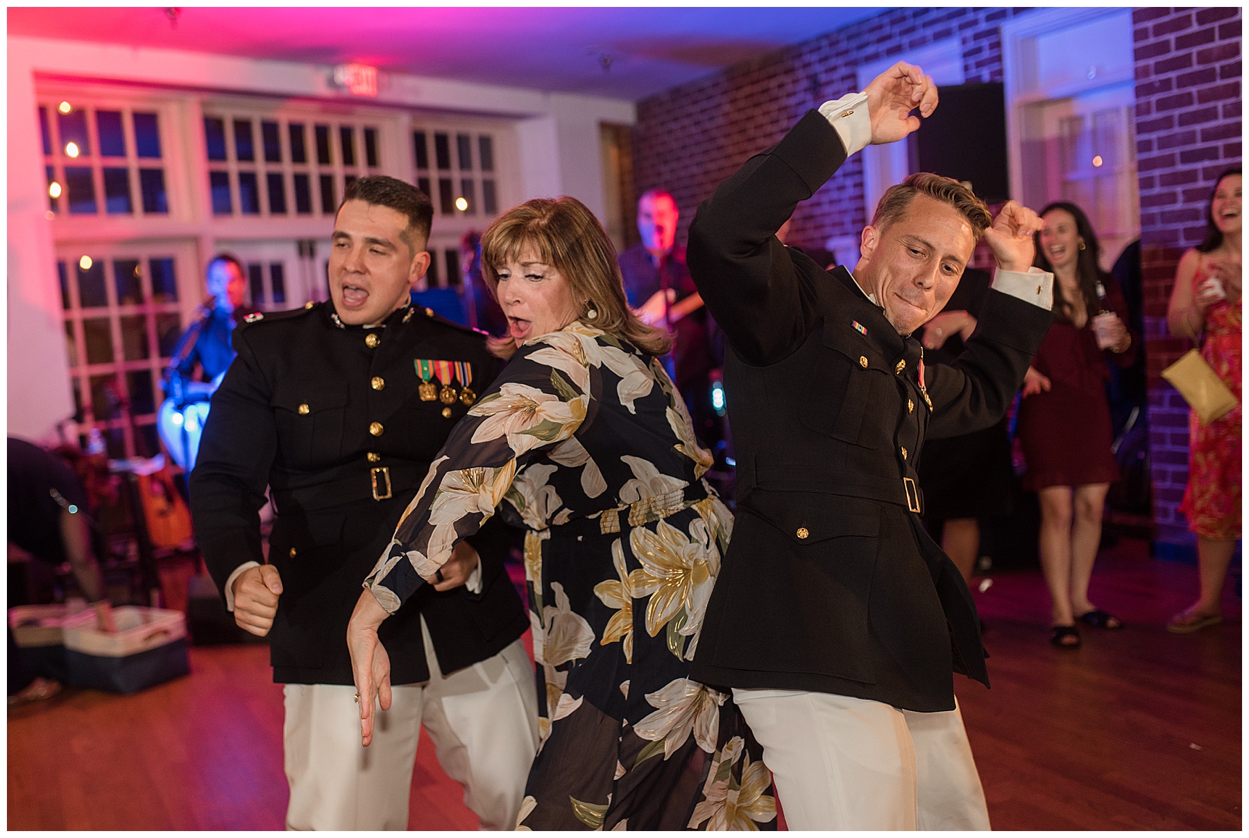 wedding reception dancing guests candid