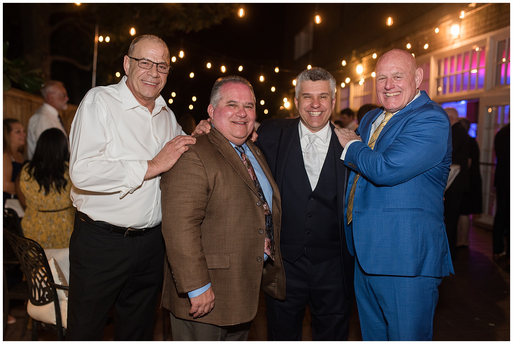 wedding reception dancing guests candid