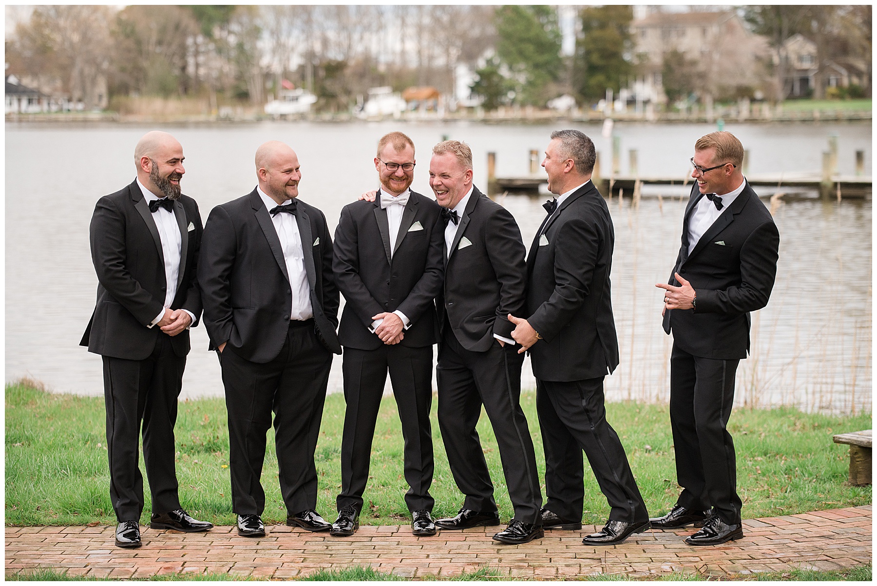 groom posing with groomsmen