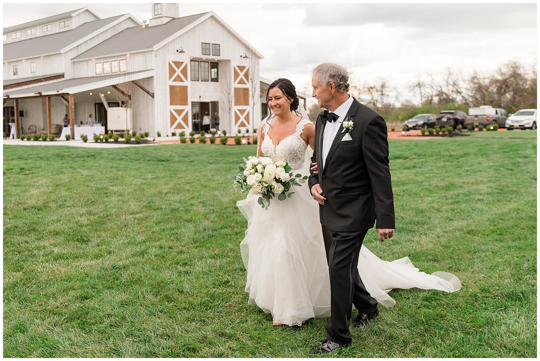 bride entering ceremony with father