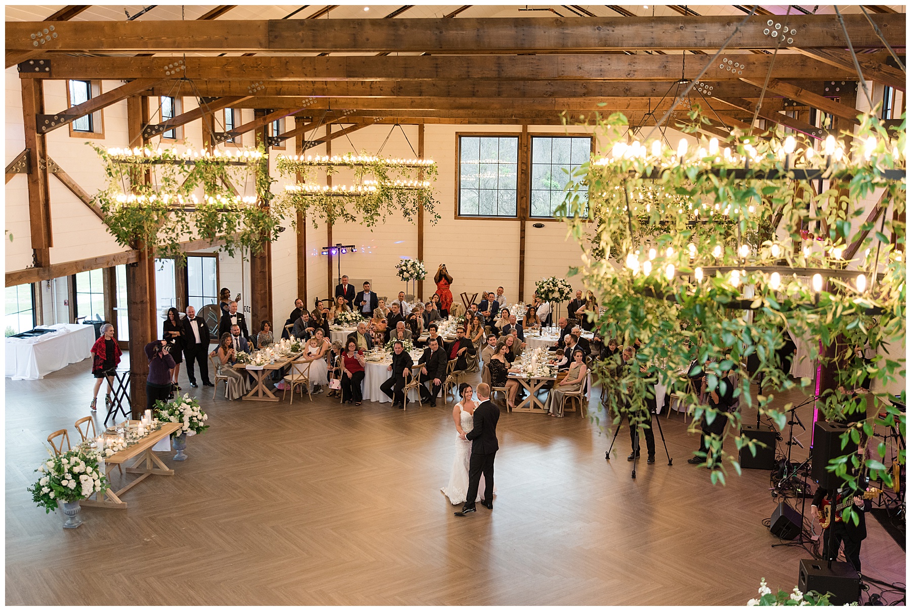 bride and groom first dance from balcony