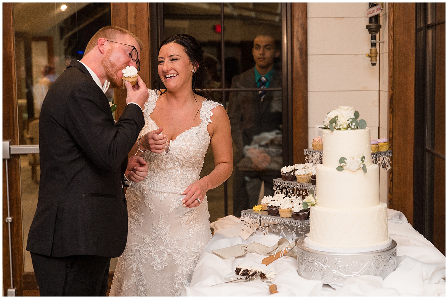 bride and groom cake cutting