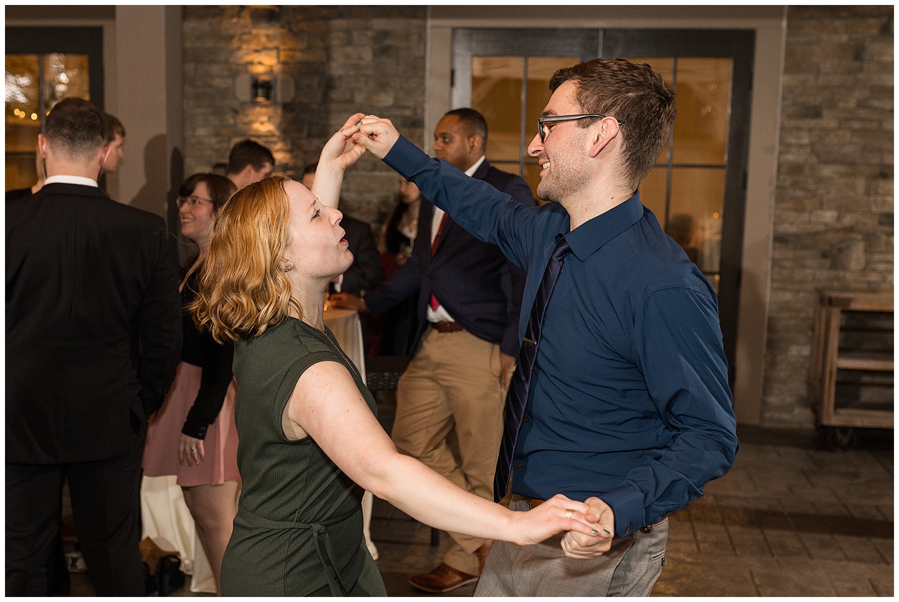 reception guests candid dancing