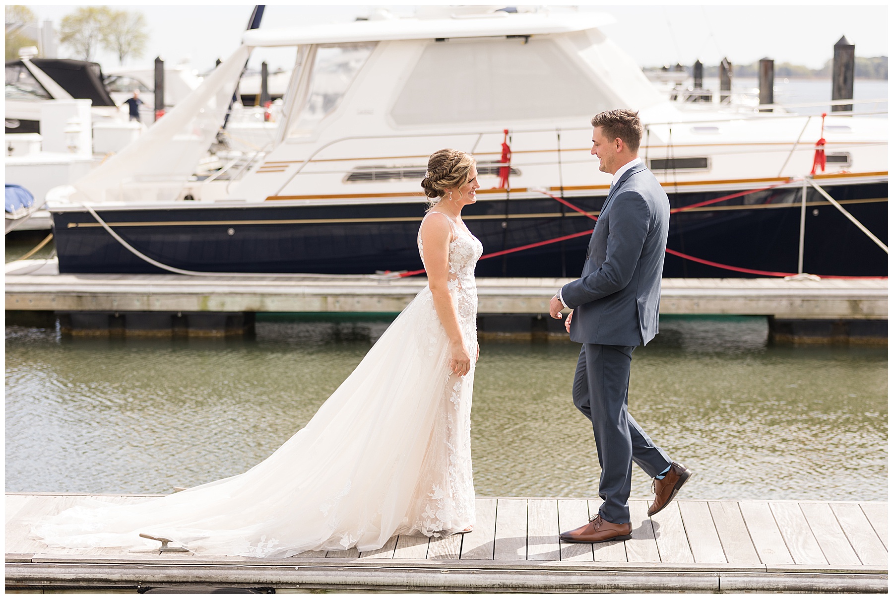 bride and groom first look on pier