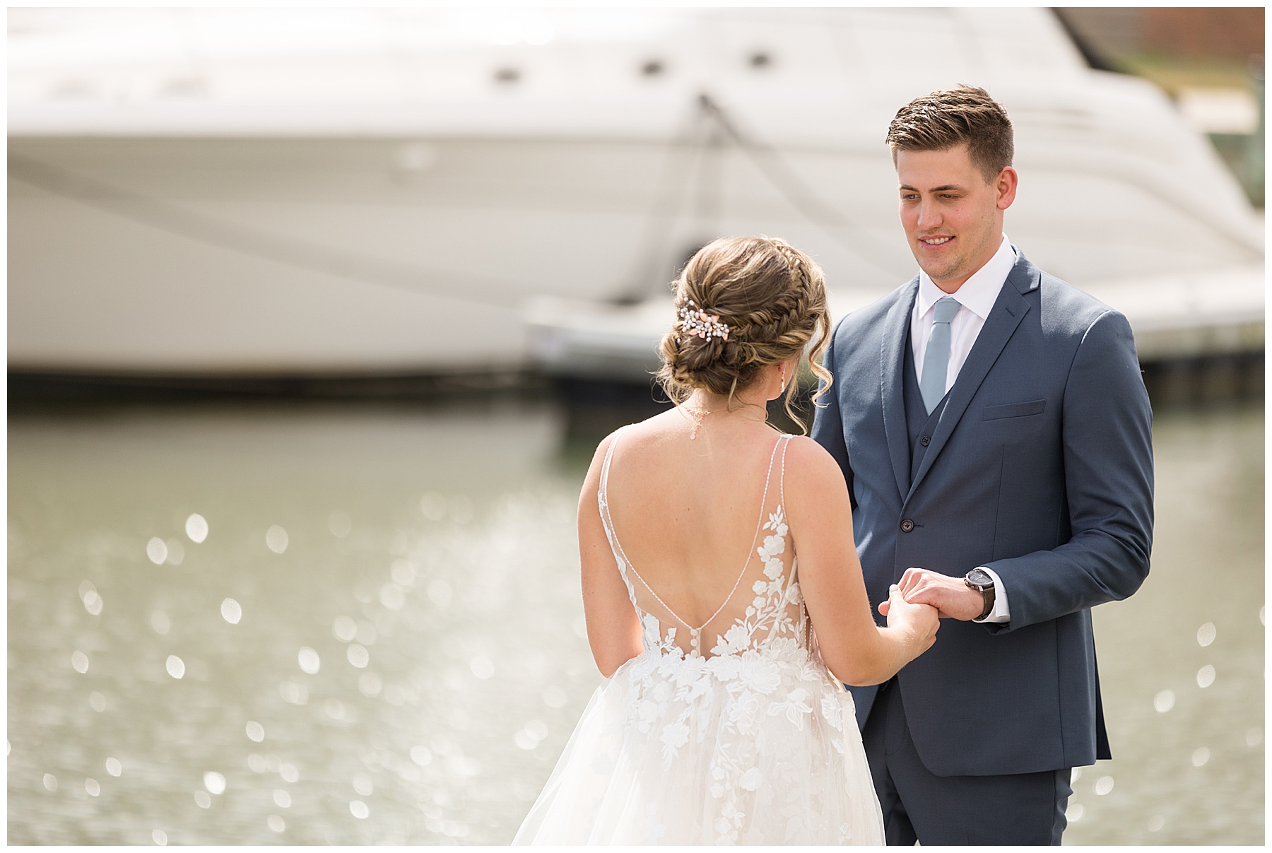 bride and groom portrait on pier