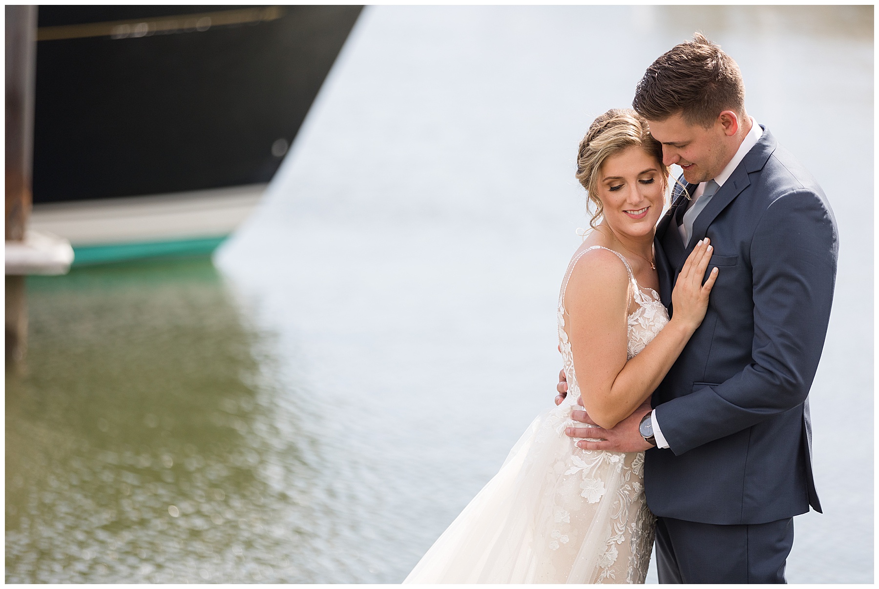 bride and groom portrait on pier