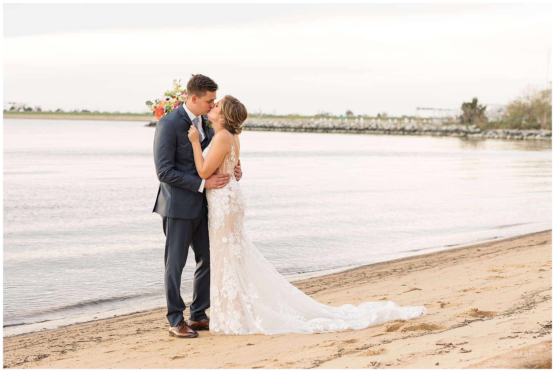 couple portrait on the beach kiss