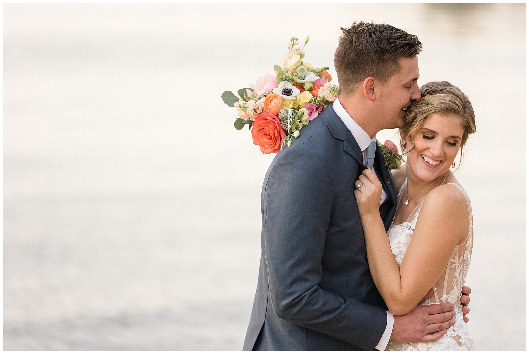 couple portrait on the beach temple kiss