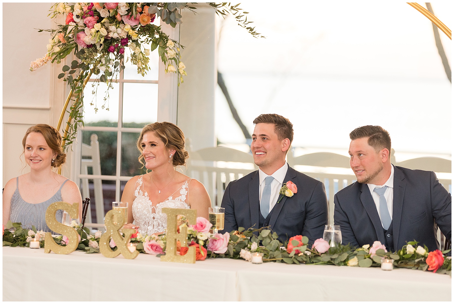 bride and groom react to speeches