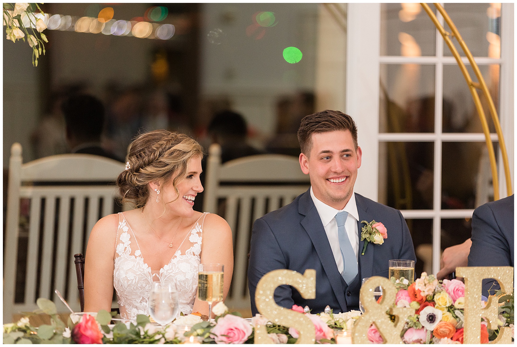 bride and groom react to speeches