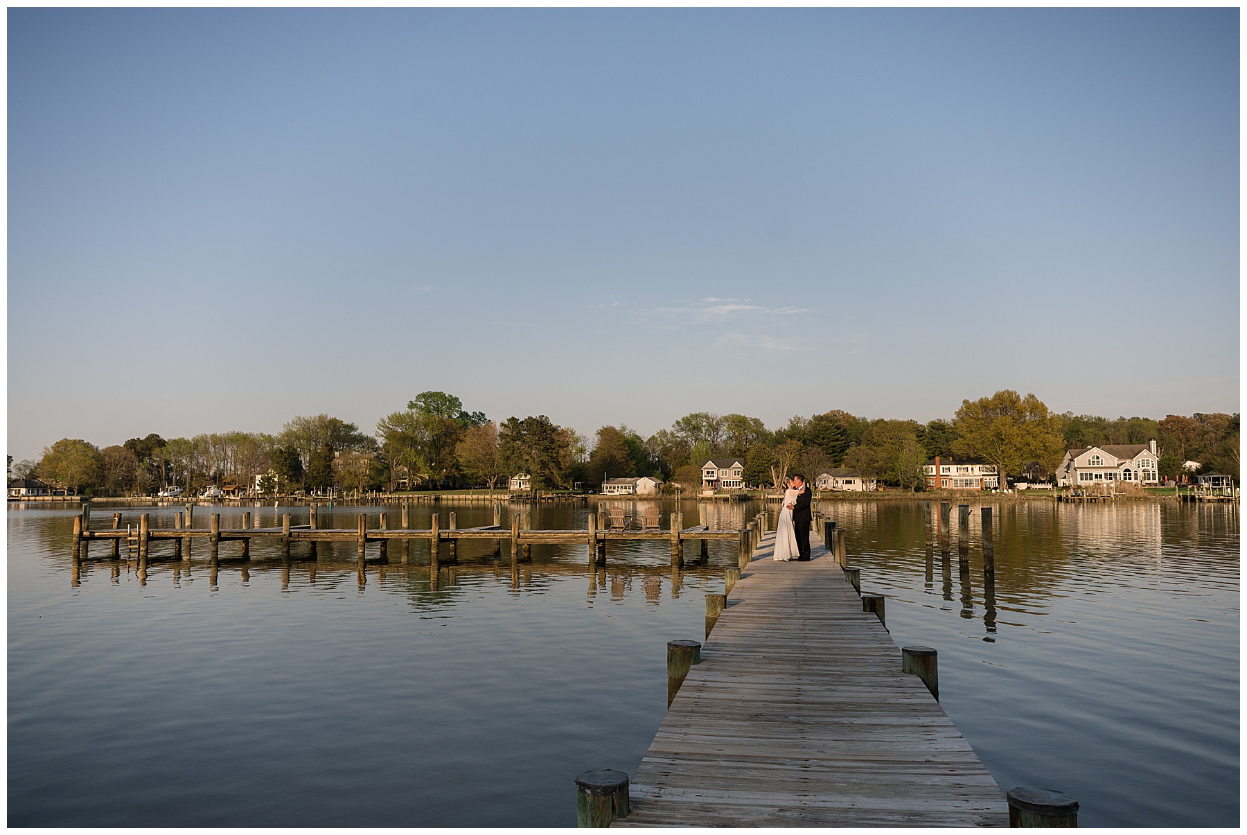 bride and groom portraits golden hour pier