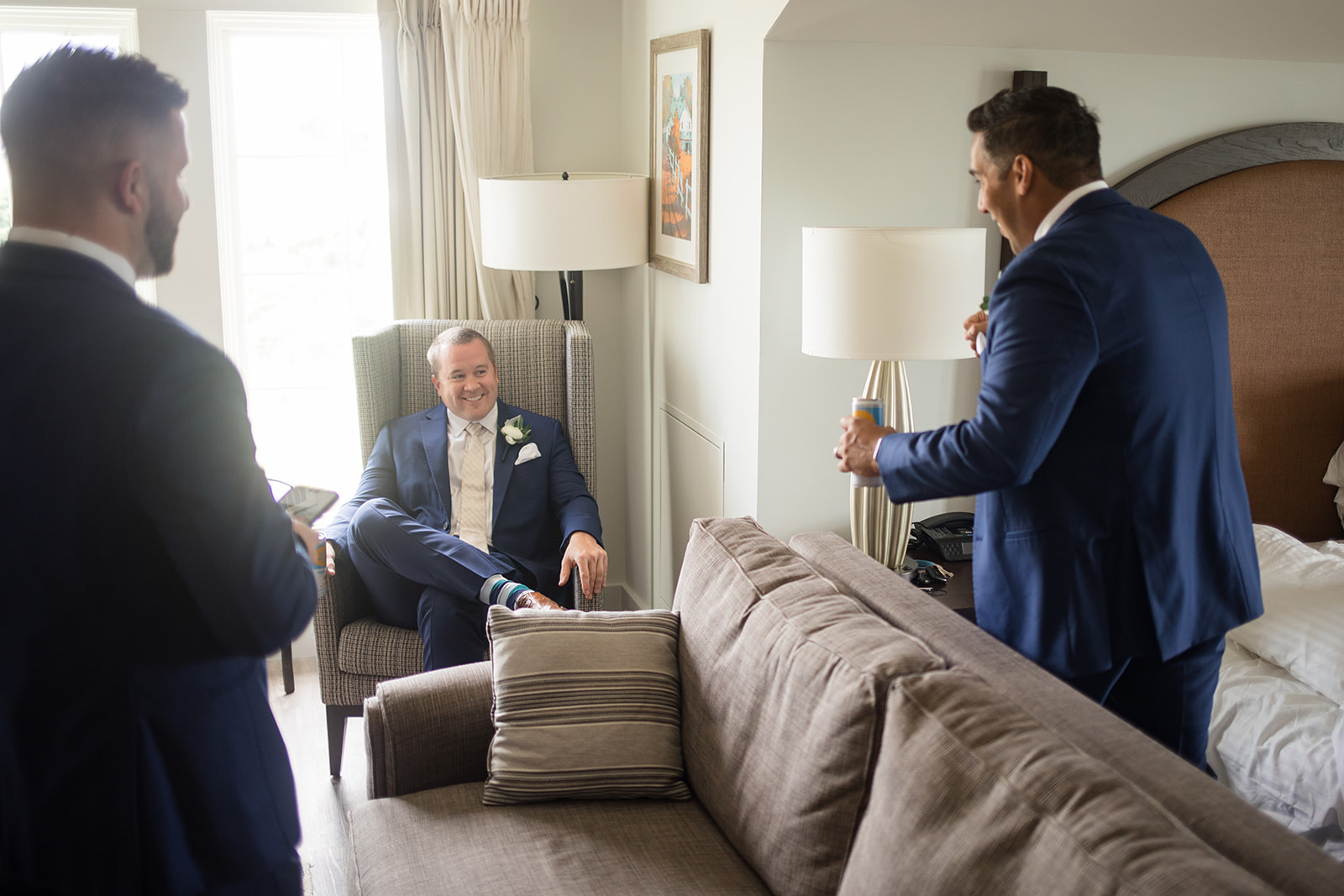 groom and groomsmen getting ready