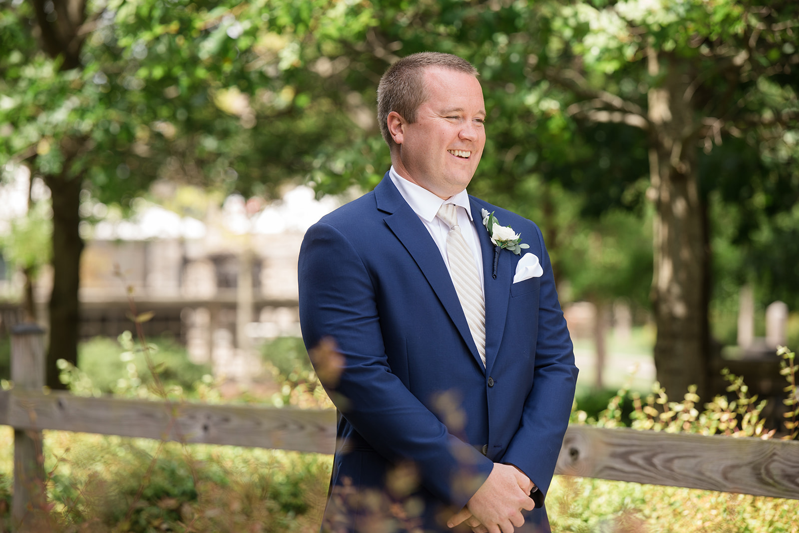 groom waiting for bride during first look