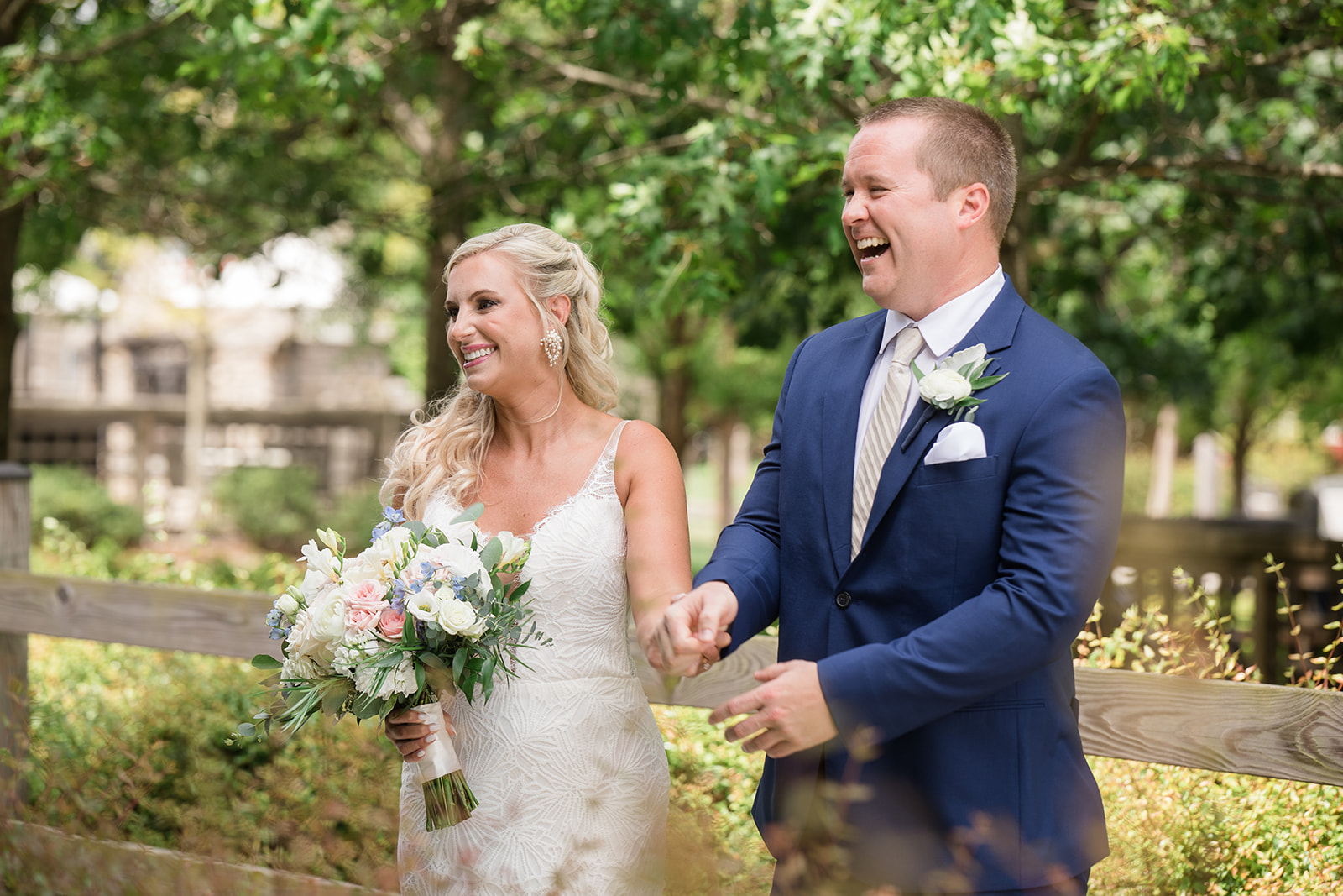 groom laughing with bride