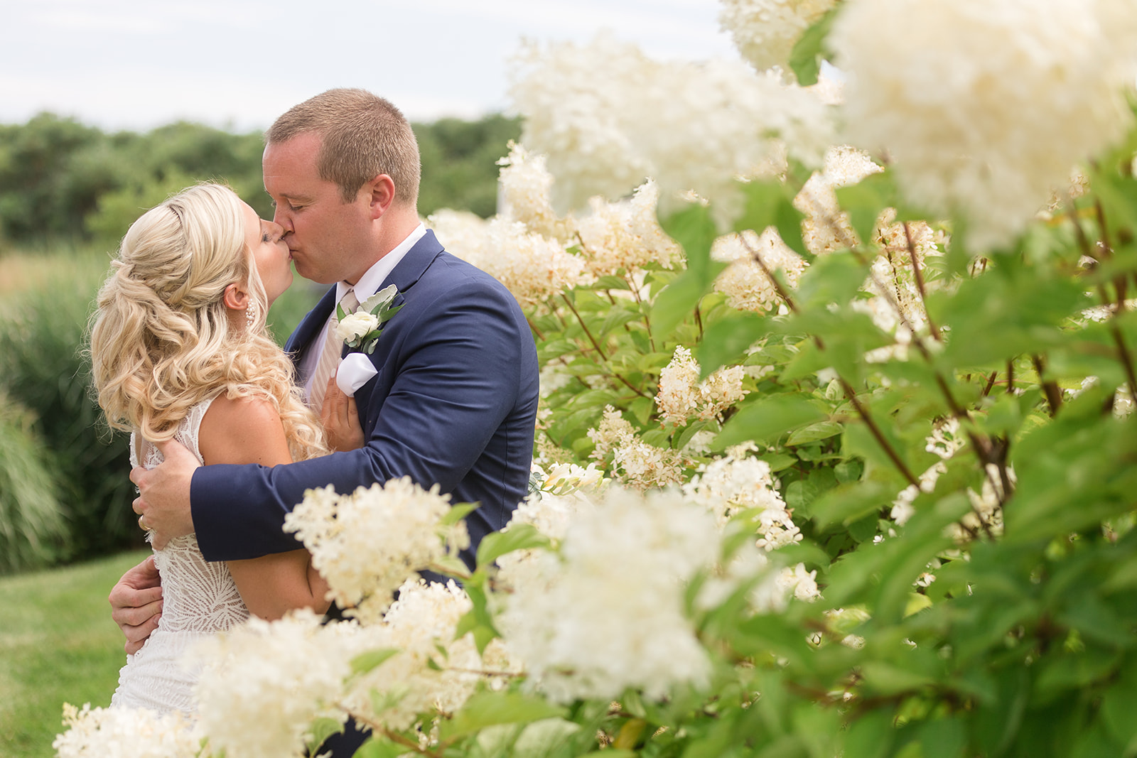 bride and groom kissing