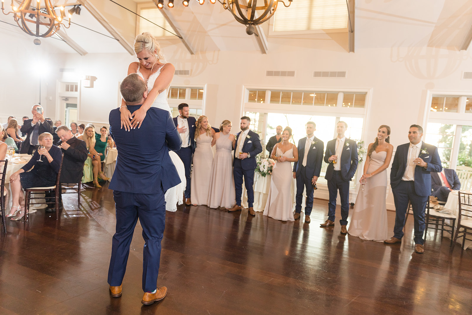 bride and groom first dance with lift