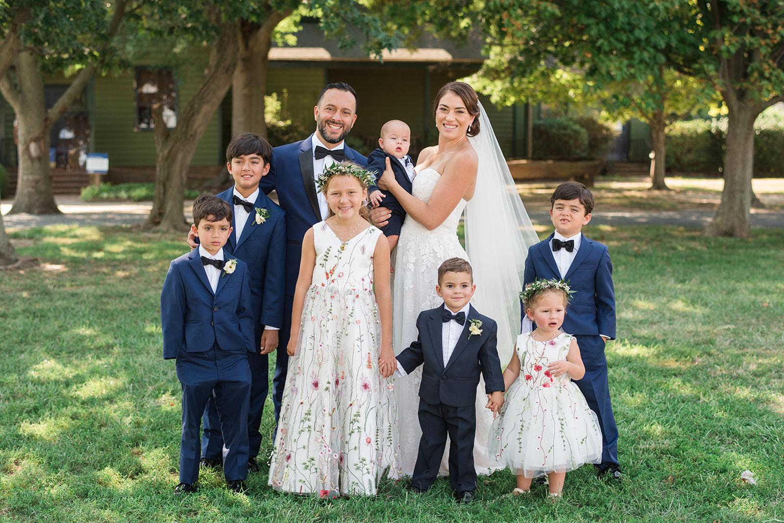 bride and groom with kids