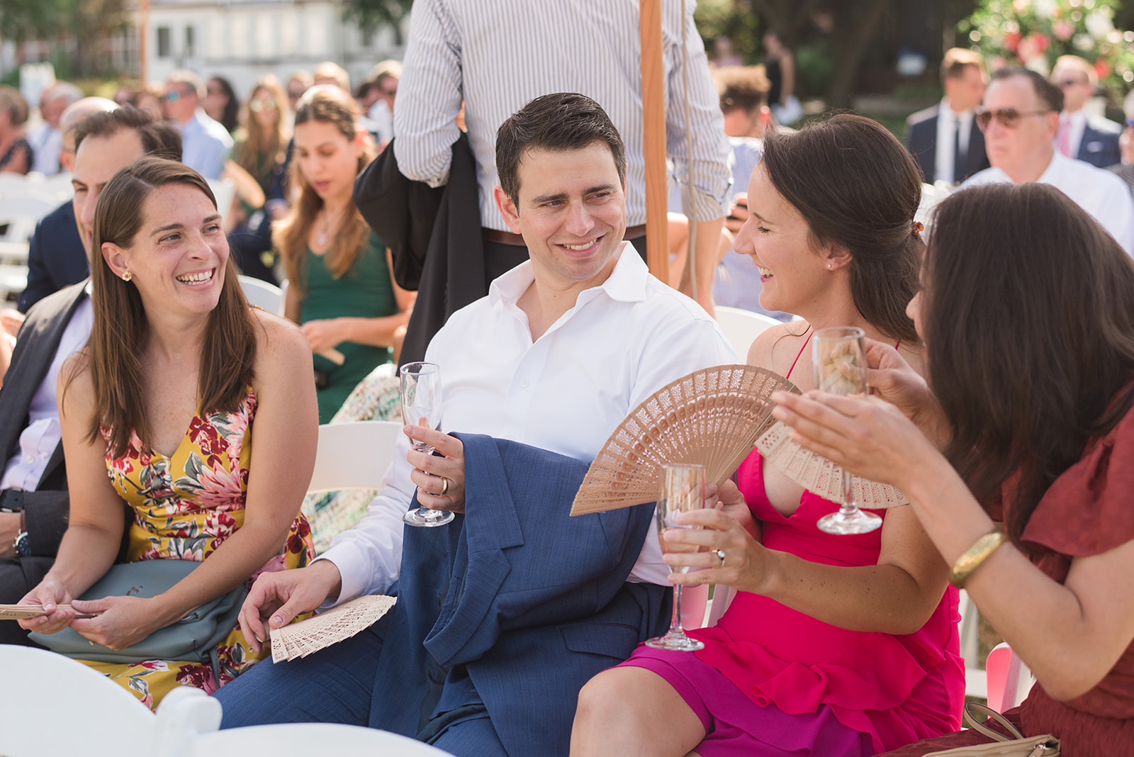 guests drinking sitting for ceremony