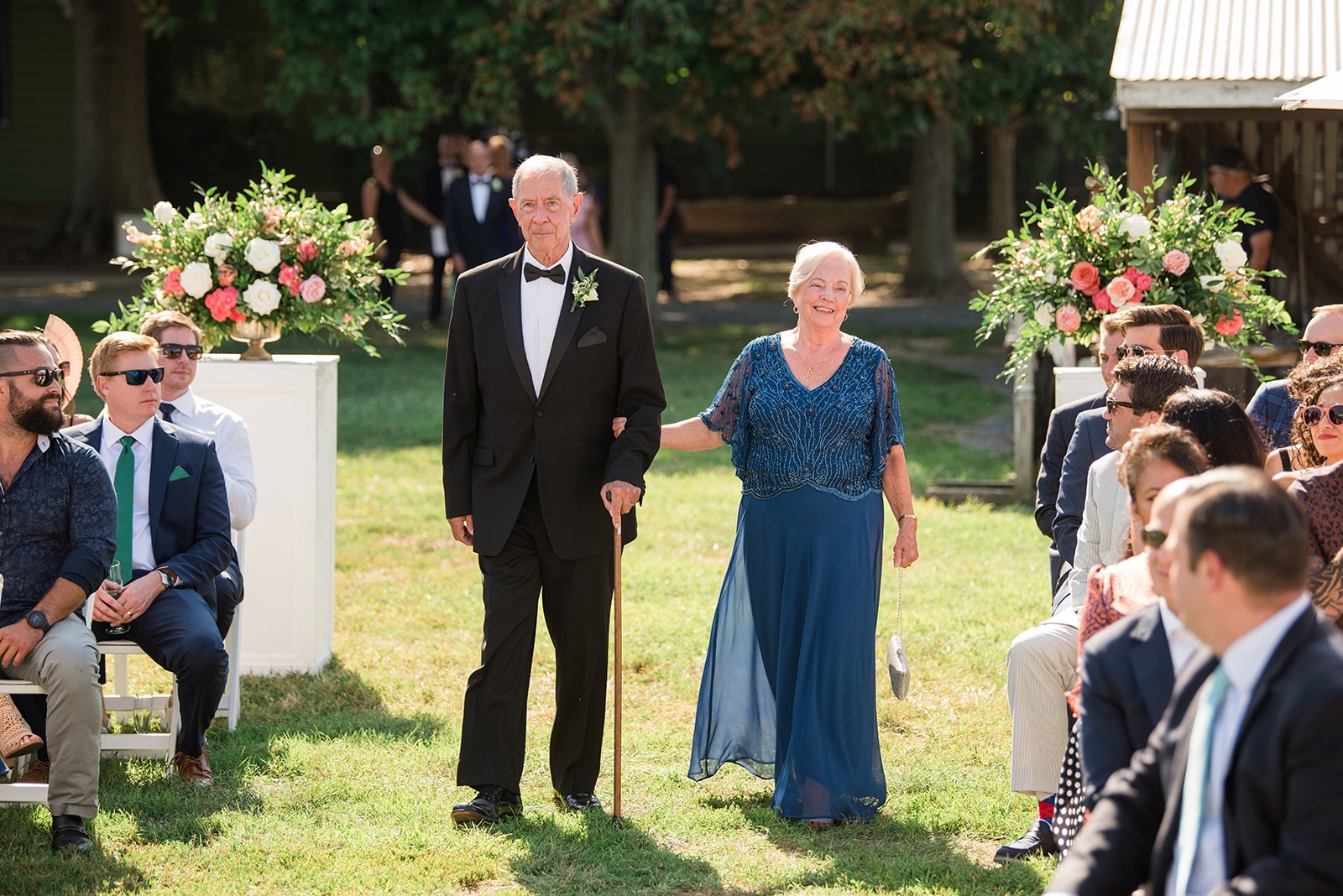 mom and dad coming down the aisle