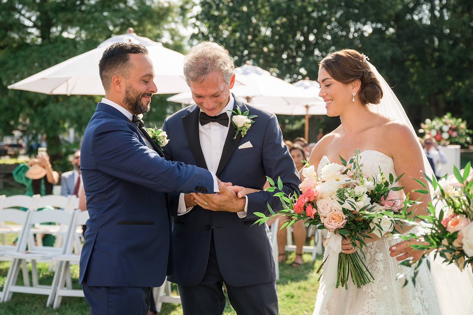 dad giving daughter away during wedding ceremony