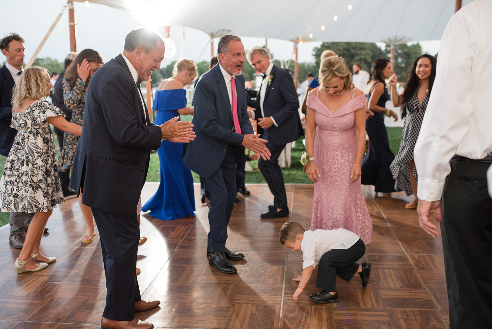 wedding dancing guests candid