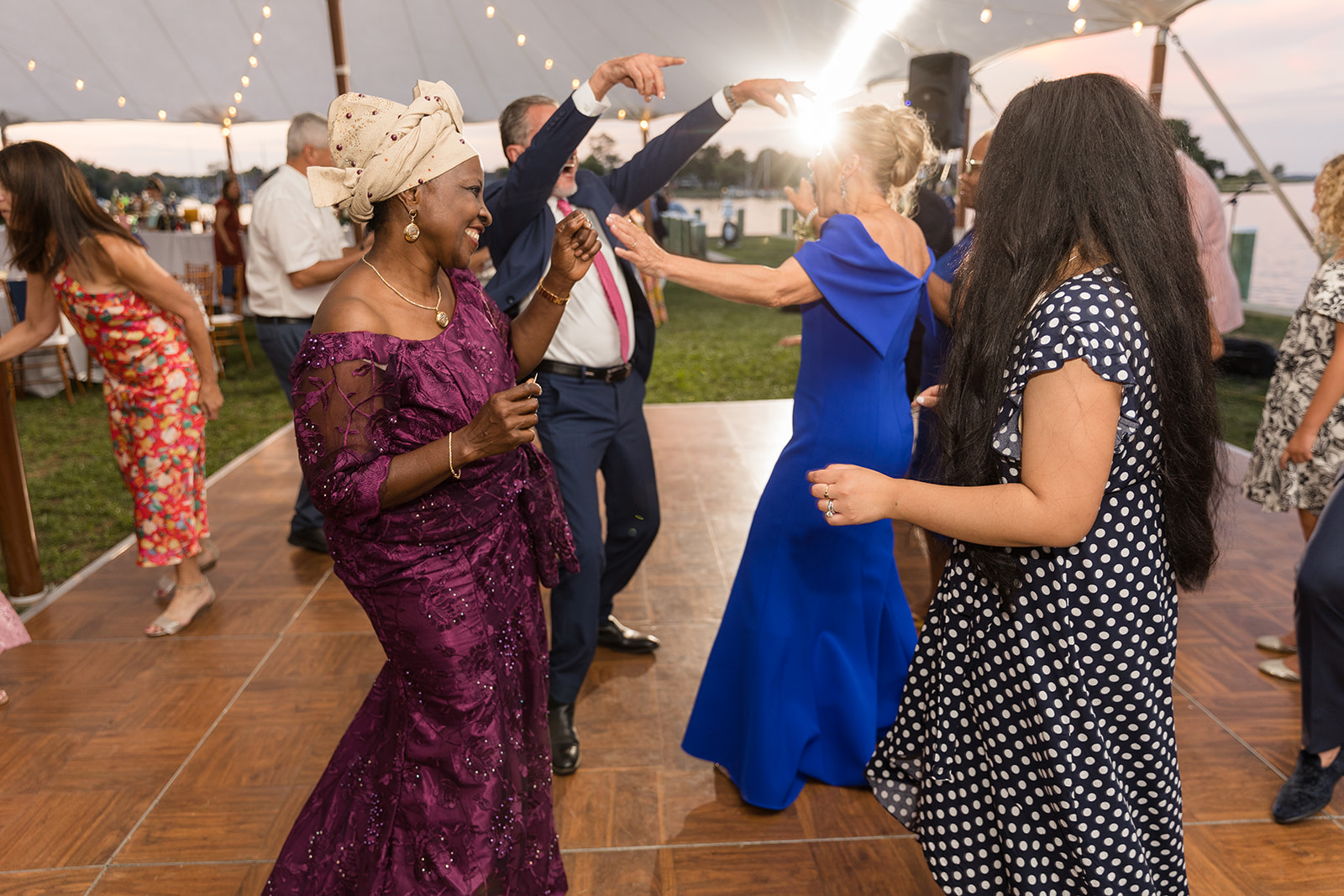 wedding dancing guests candid