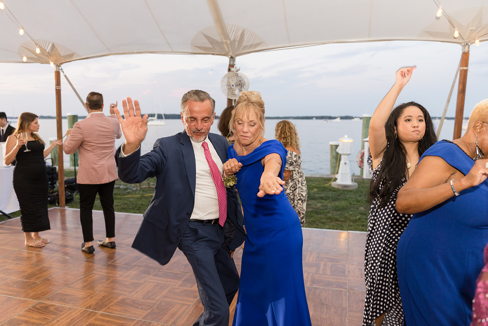 wedding dancing guests candid