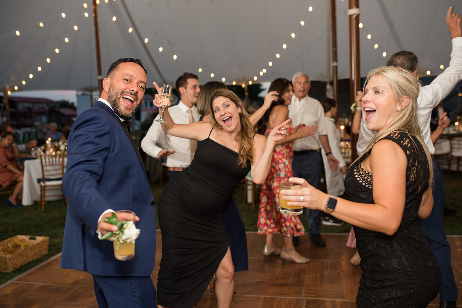 wedding dancing guests candid