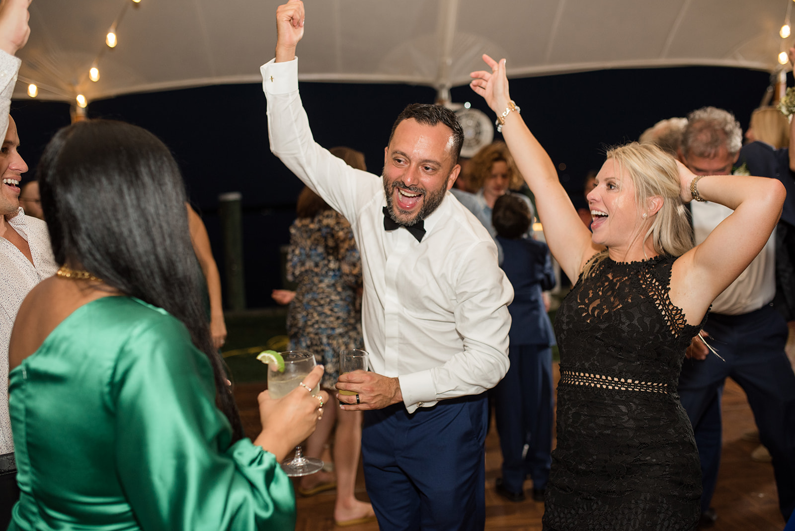 wedding dancing guests candid