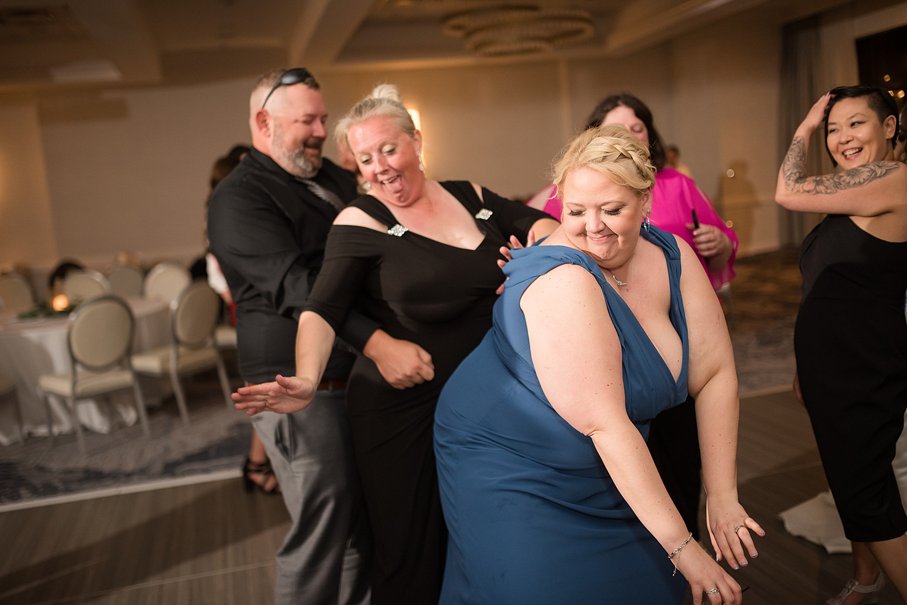 candid wedding dancing