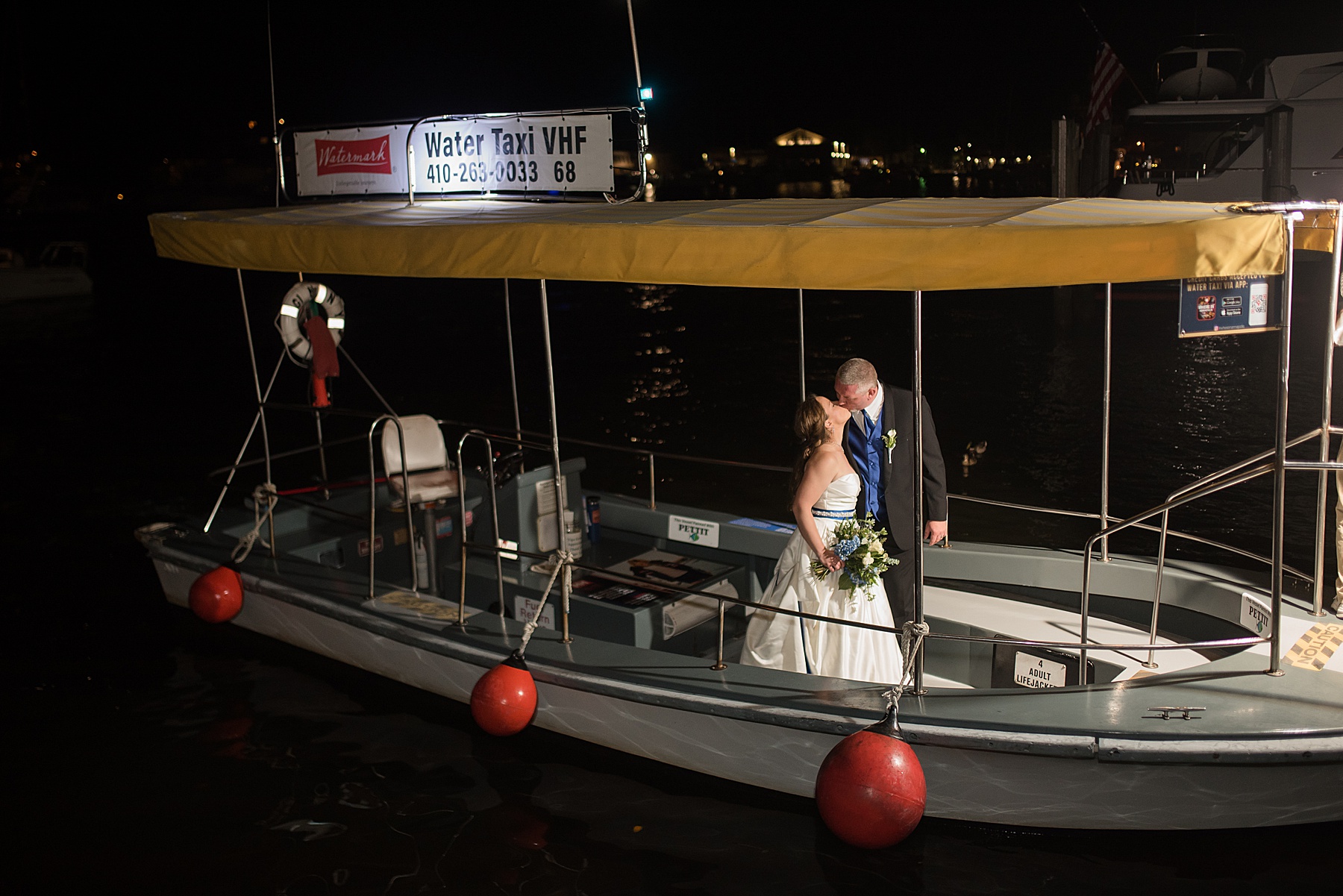 bride and groom night shot annapolis water taxi