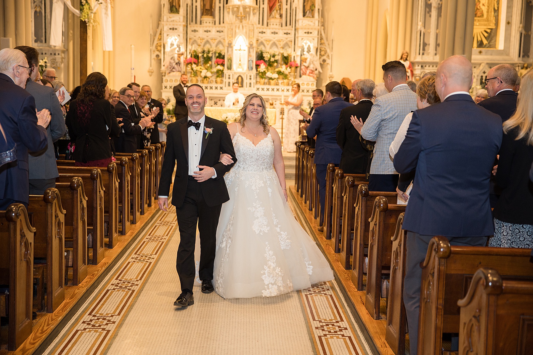 bride and groom recess from ceremony