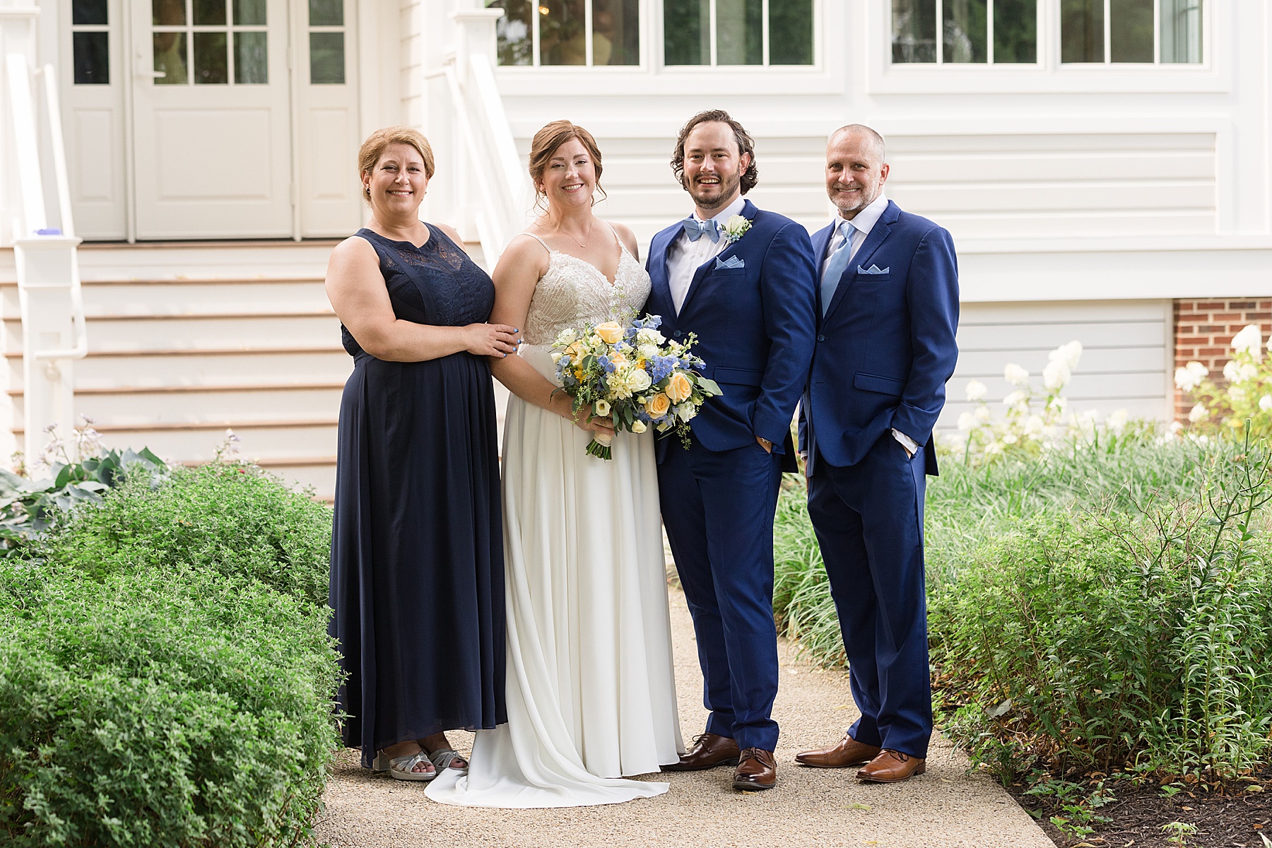 bride and groom and parents