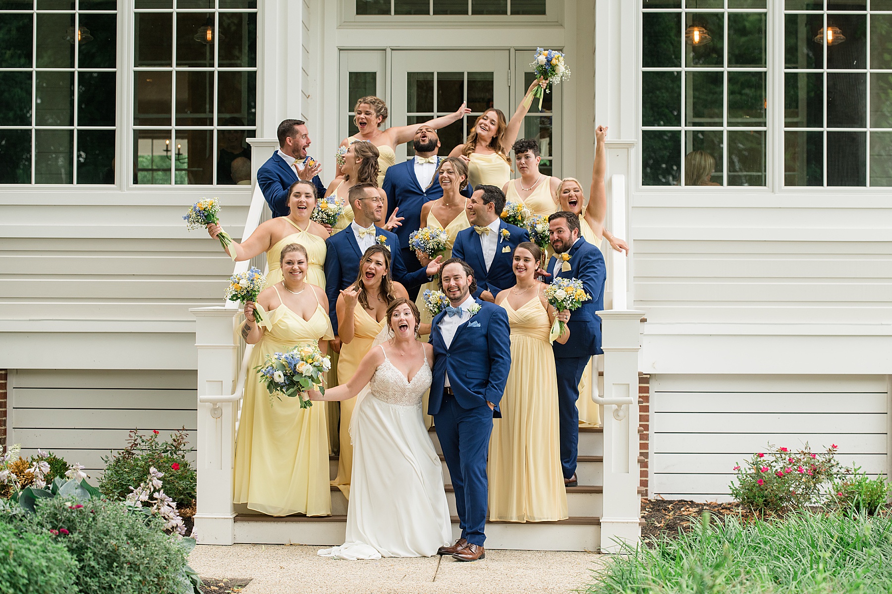 full wedding party on kent island resort steps