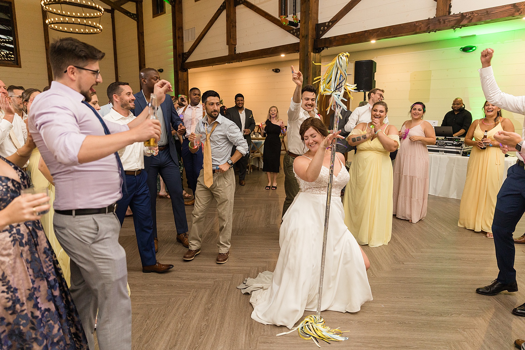 candid wedding guests dancing