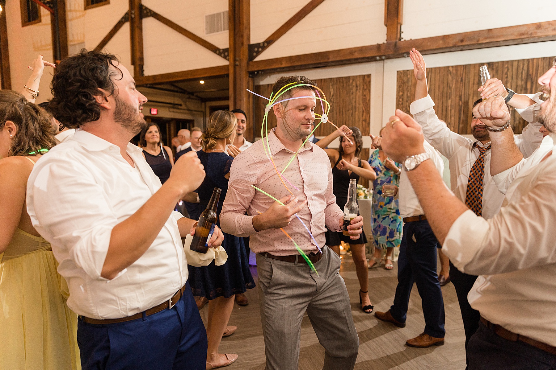 candid wedding guests dancing